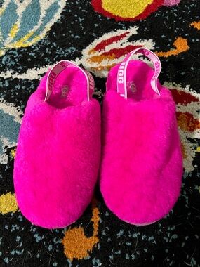 Pink fuzzy Ugg kids slip on